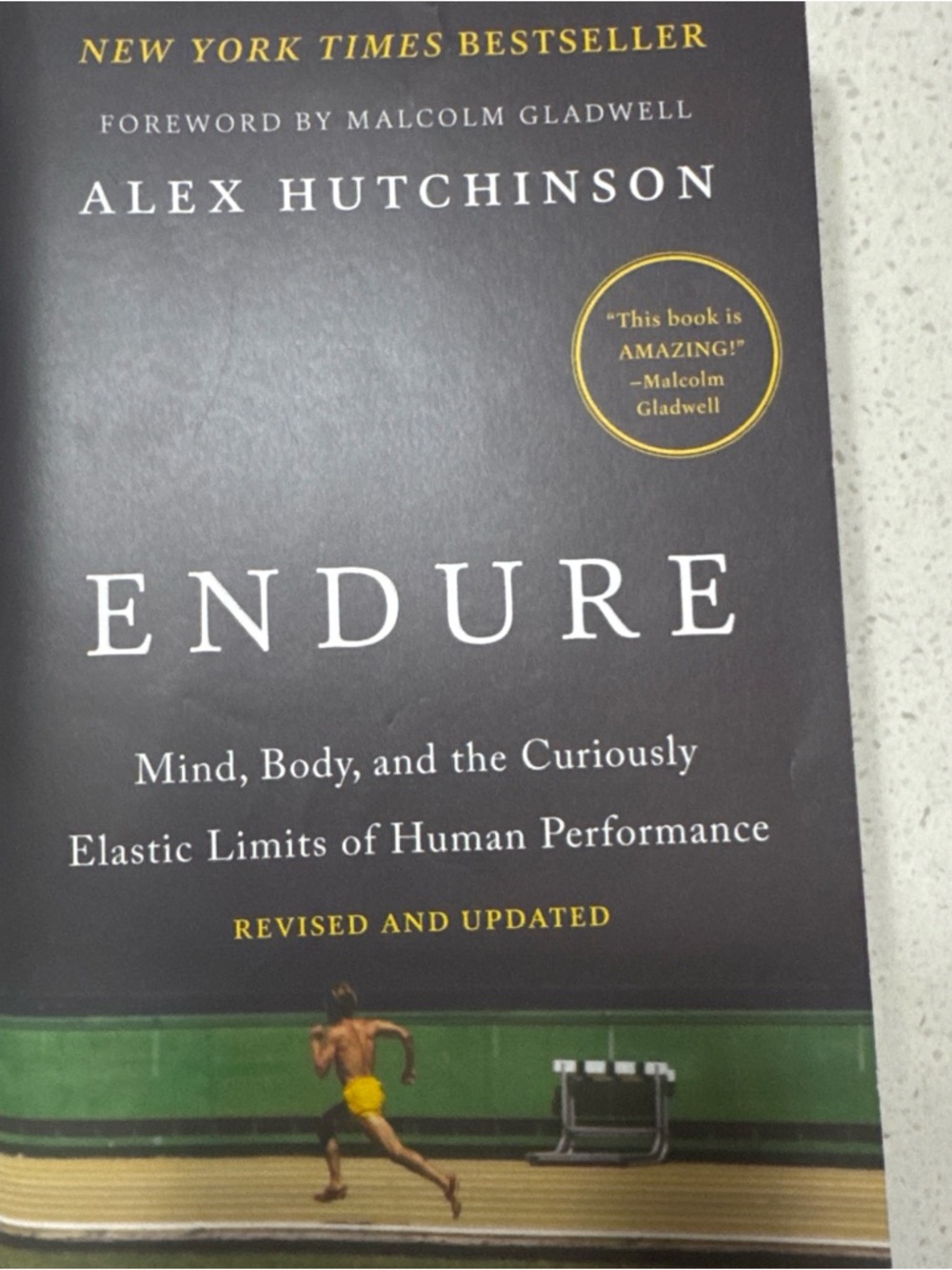 Endure by Alex Hutchinson - Black Cover with Green & Yellow Accent